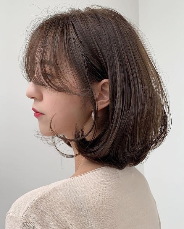 Tóc xoăn đuôi uốn cúp 